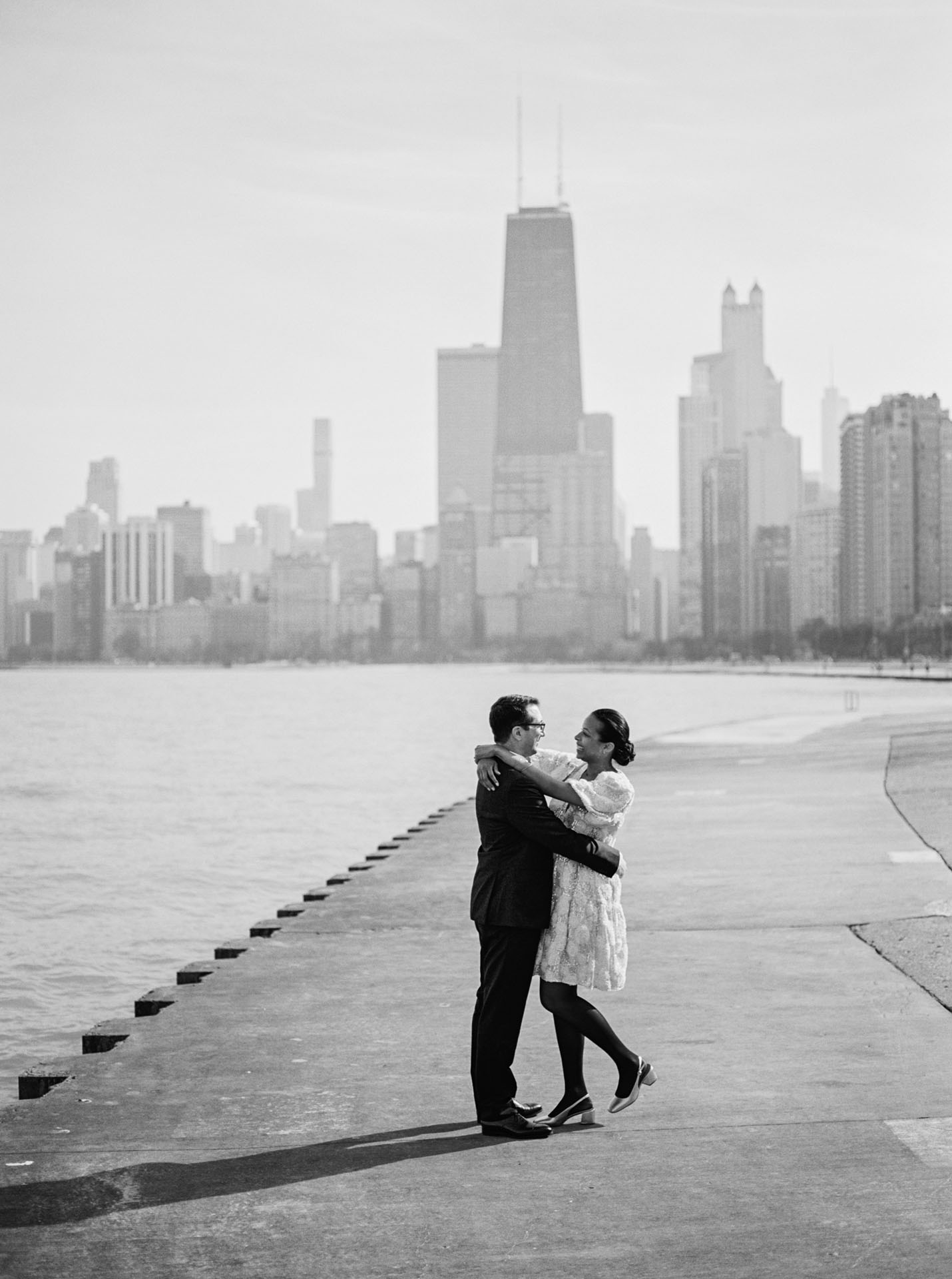 bride and groom along the lakefront in Chicago