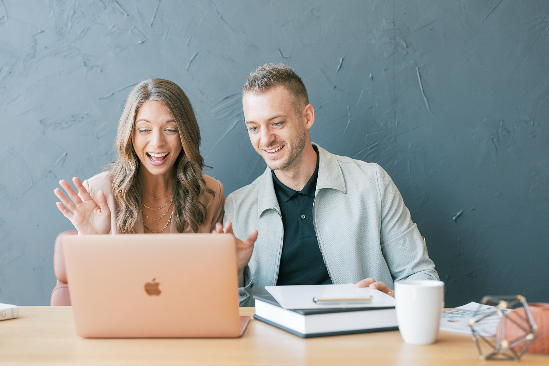 Kaleb and Becky hugging and laughing