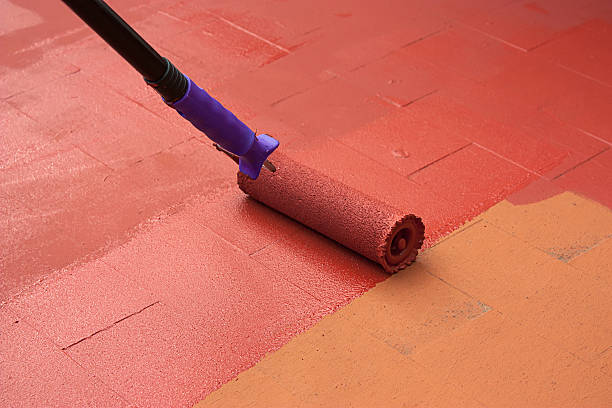 Peinture époxy appliquée sur un sol de garage