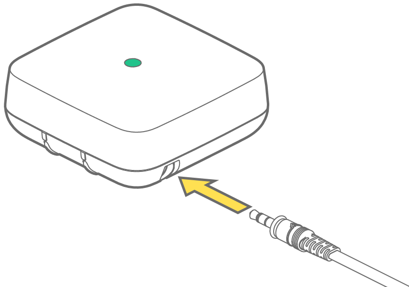Sensor Relay on it's side, the antenna being placed onto the device and secured clockwise