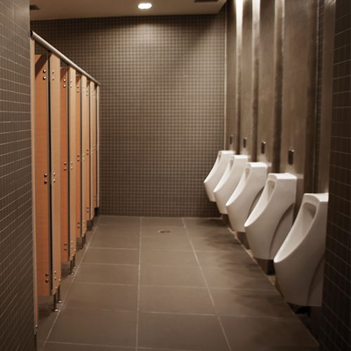 public restroom with toilets and urinals