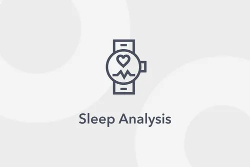 A person sleeping in bed while wearing a smartwatch.