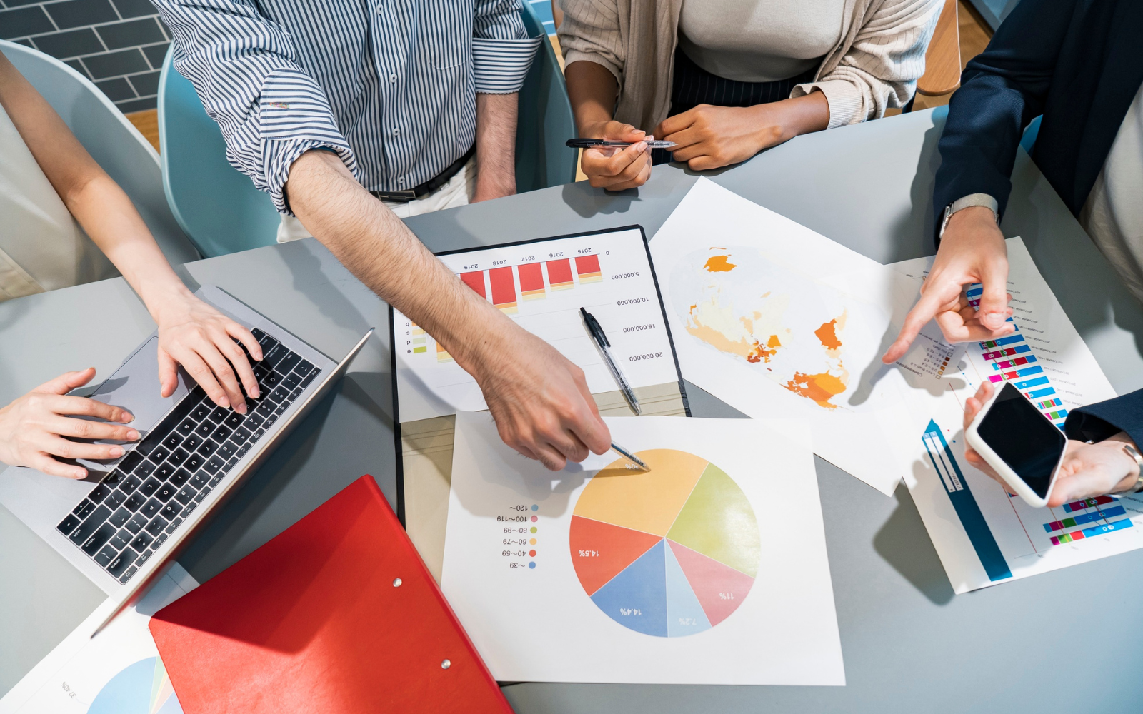 Employees looking over data from their loyalty program.