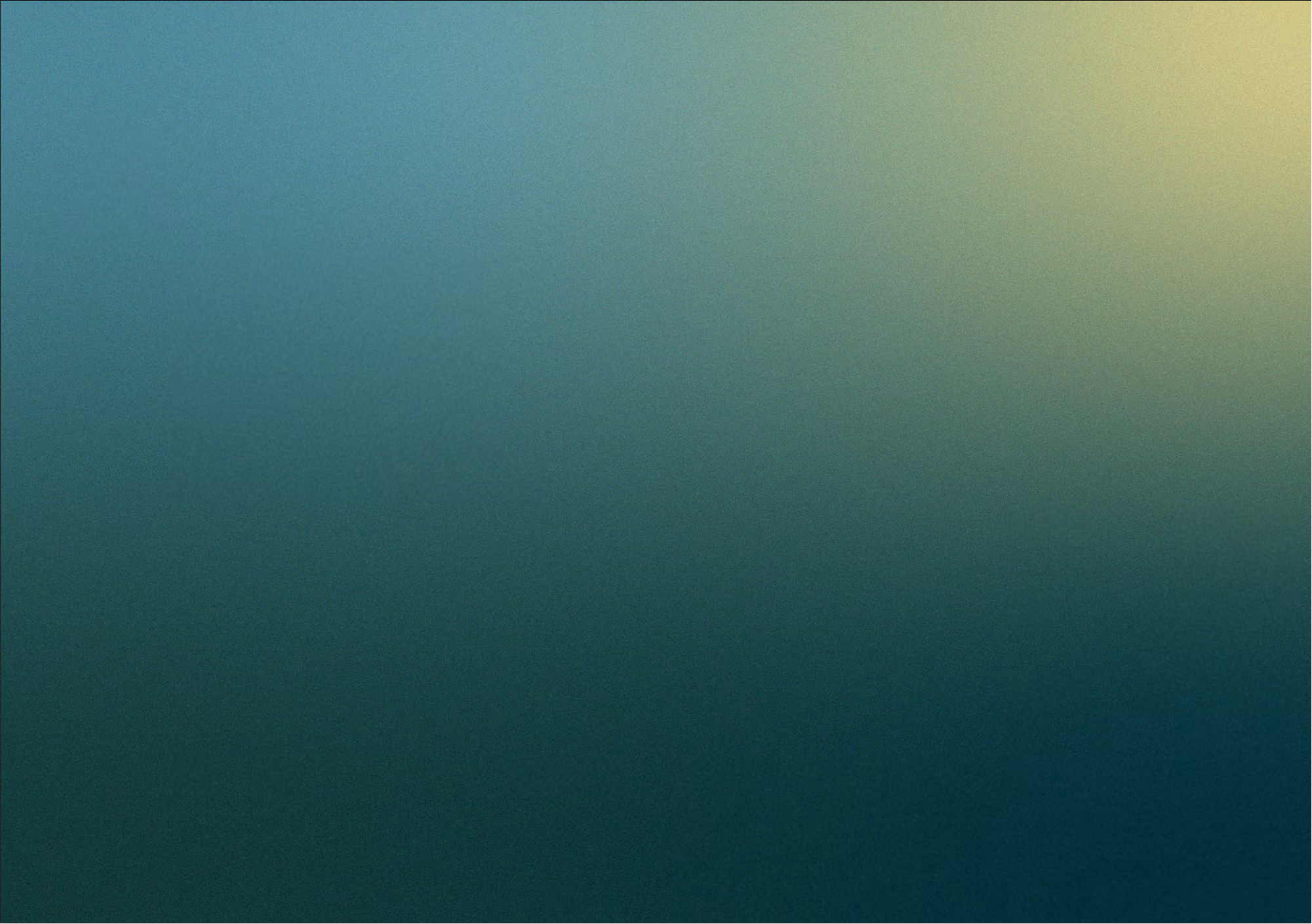 Abstract gradient from teal to dark green and pale yellow