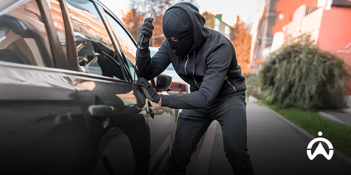 Cartrack car camera capturing attempted car theft on urban street.