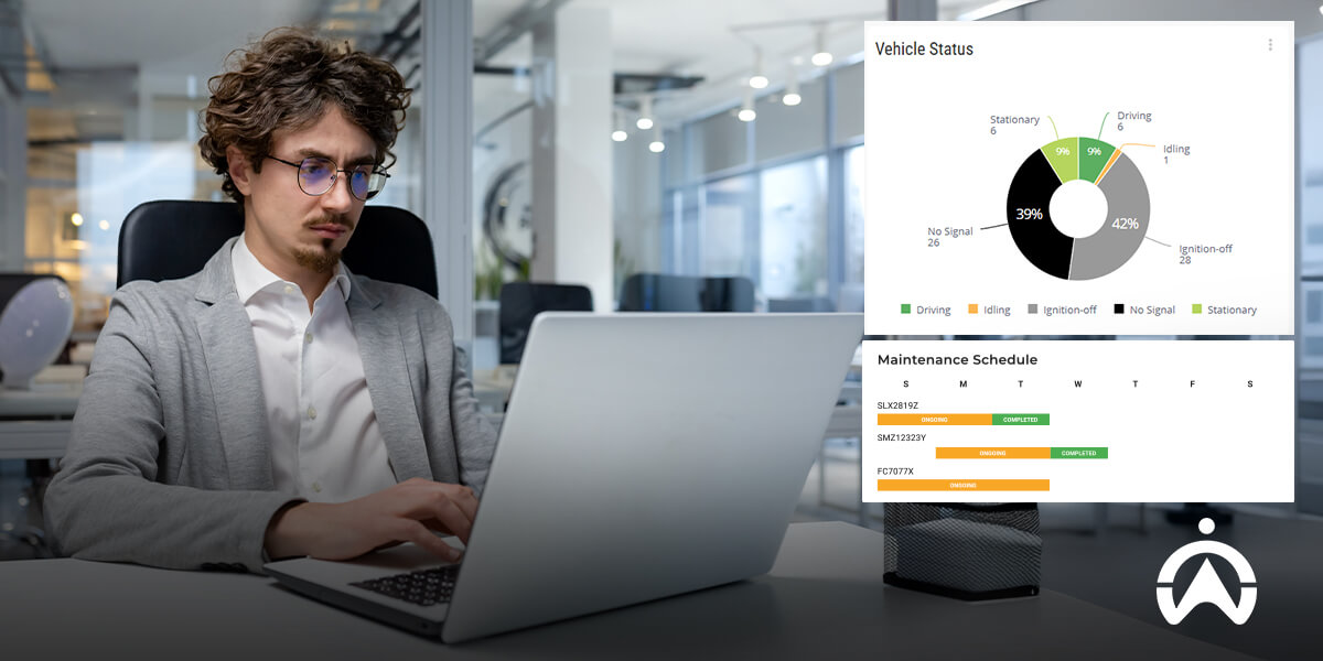 Cartrack delivery driver management software on laptop showing vehicle status graphs and maintenance schedules.