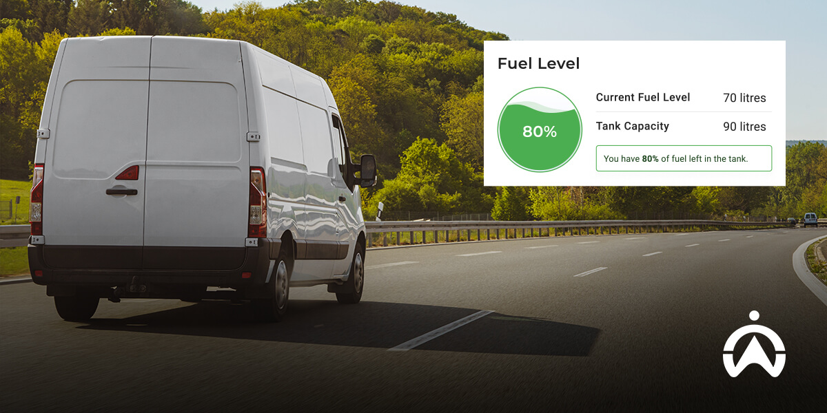 A white delivery van driving on a highway, with a fuel level display showing 80% fuel remaining. Green trees line the road.