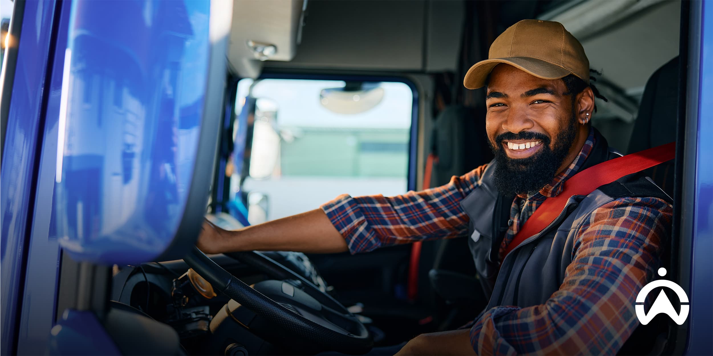 Truck driver operating a utility vehicle, illustrating how a utilities fleet management system improves fleet visibility and driver monitoring