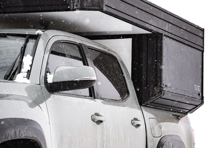 winter camping in a pop-up camper