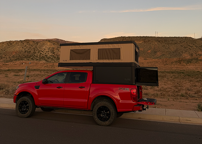 Pop-up truck camper on a ford ranger