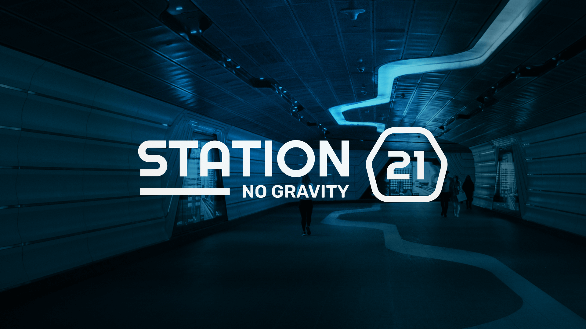 centro de uma espaço nave com a logo Station 21 centralizada