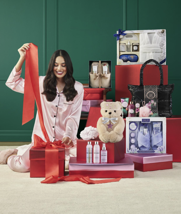 a lady unboxing the gifts