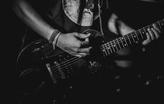 A man playing a guitar