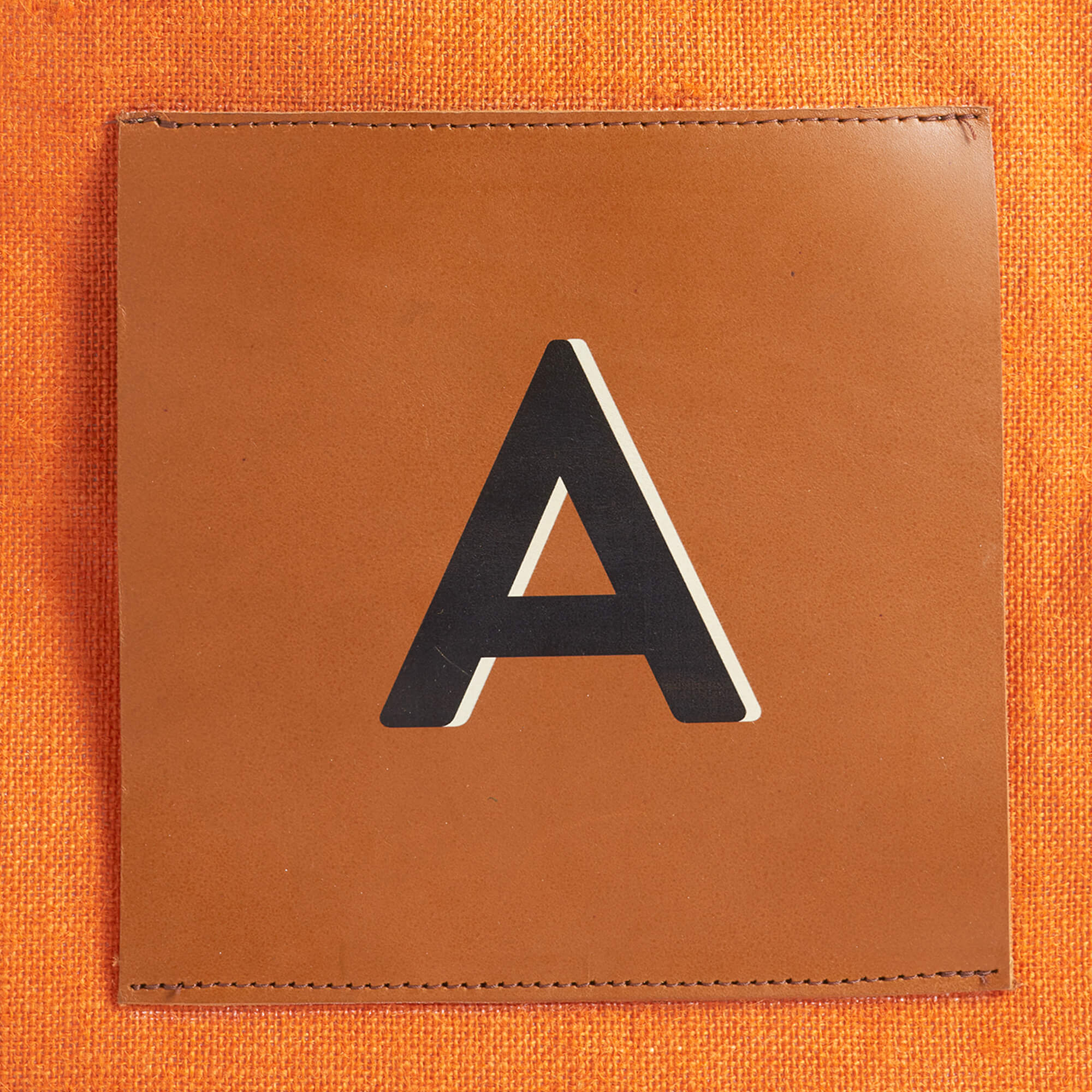 People celebrating at an event with a customized market sitting at the center of the table