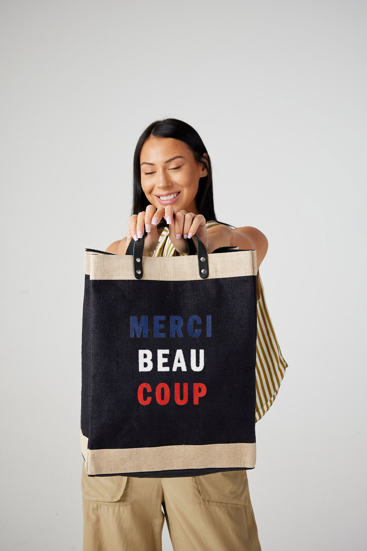 A market bag hanging on a chair at an event