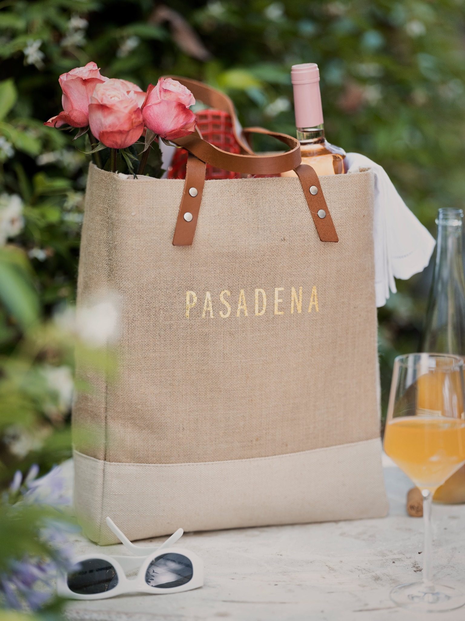 A market bag hanging on a chair at an event