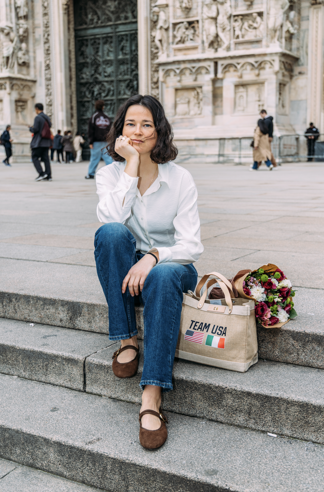 A market bag hanging on a chair at an event