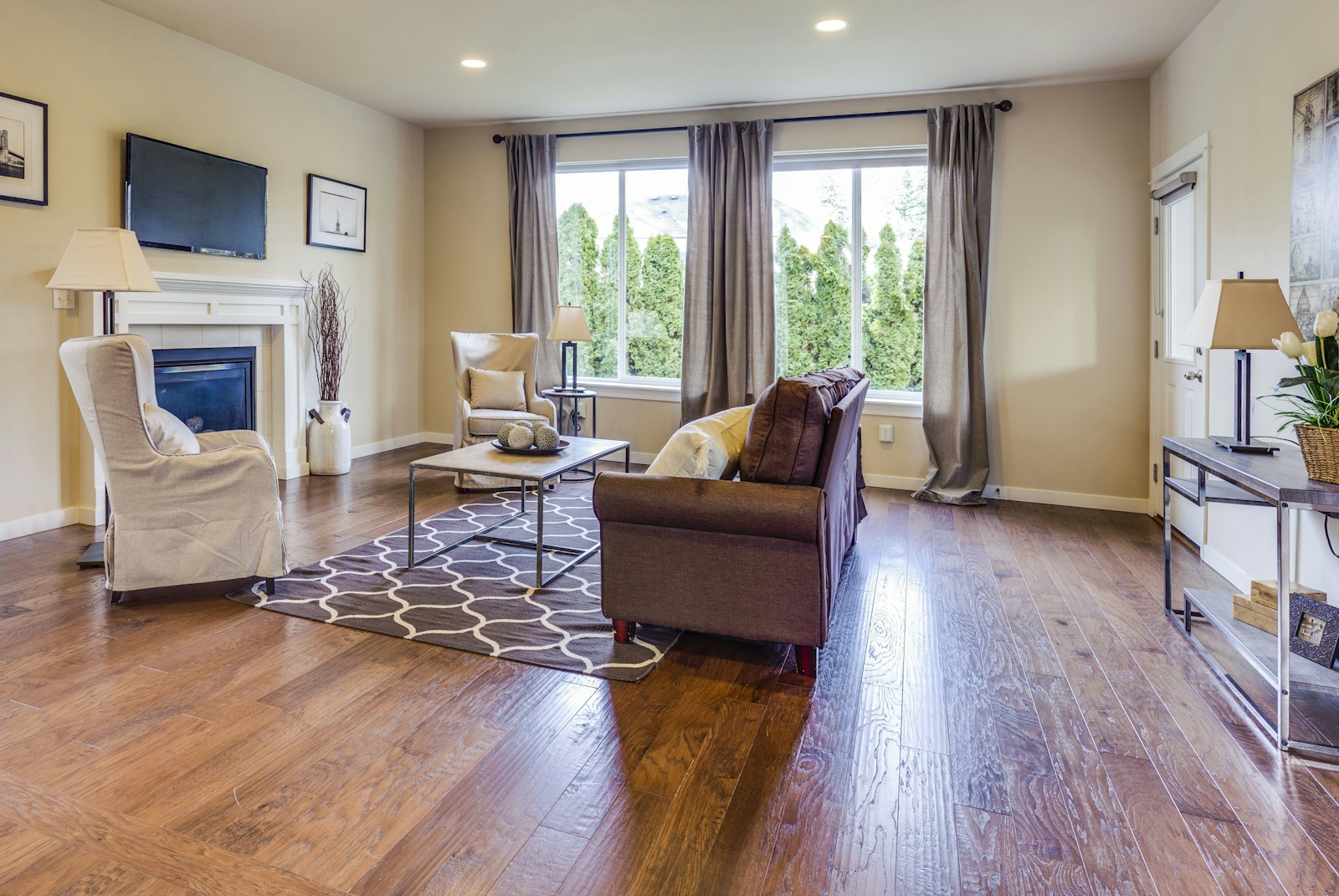 Warm hardwood flooring in an open living space