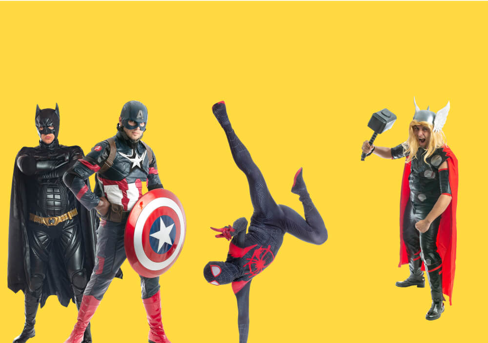 Batman on the left, Captain America in the middle left holding a shield, Spiderman in the middle right doing a one arm handstand, and Thor wielding his hammer on the right