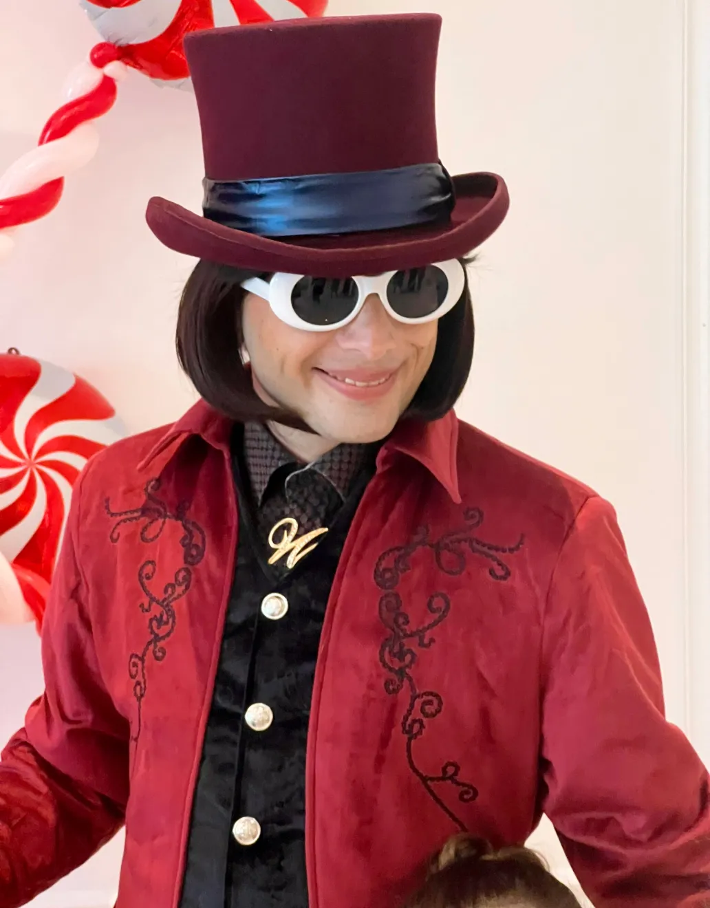 Willy Wonka looking into the bright future of his factory