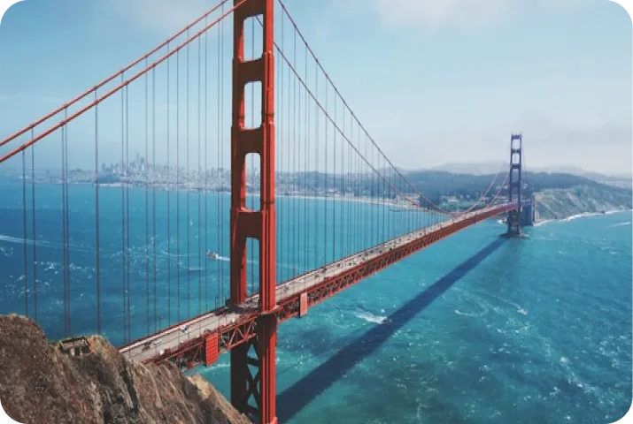 Cloud Gate sculpture, also known as The Bean, reflecting surrounding buildings and people in Millennium Park, Chicago.