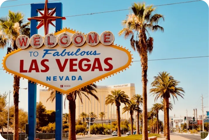 Cloud Gate sculpture, also known as The Bean, reflecting surrounding buildings and people in Millennium Park, Chicago.