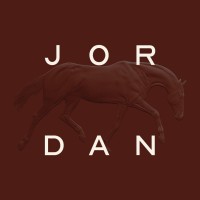 Silhouette of a running horse with the word JORDAN arranged around it on a brown background.