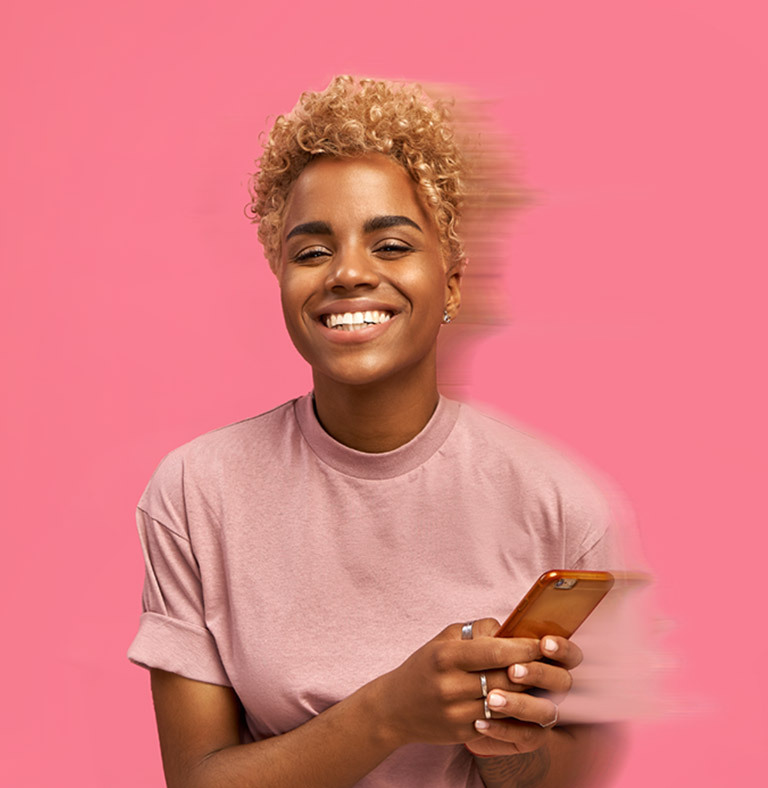 Caribbean woman using her mobile
