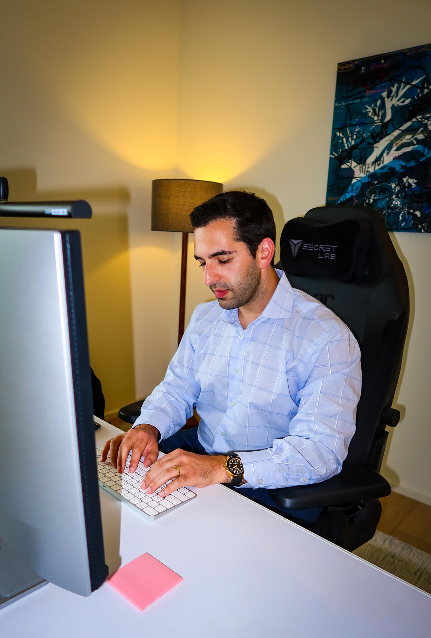 Jason Friedman, AdvisorFinder CEO and co-founder, working at his desk.