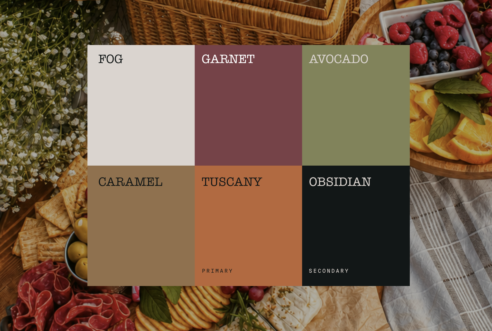 The Ranch at Huffles color palette: Fog, Garnet, Avocado, Caramel, Tuscany and Obsidian, over a harvest picnic spread