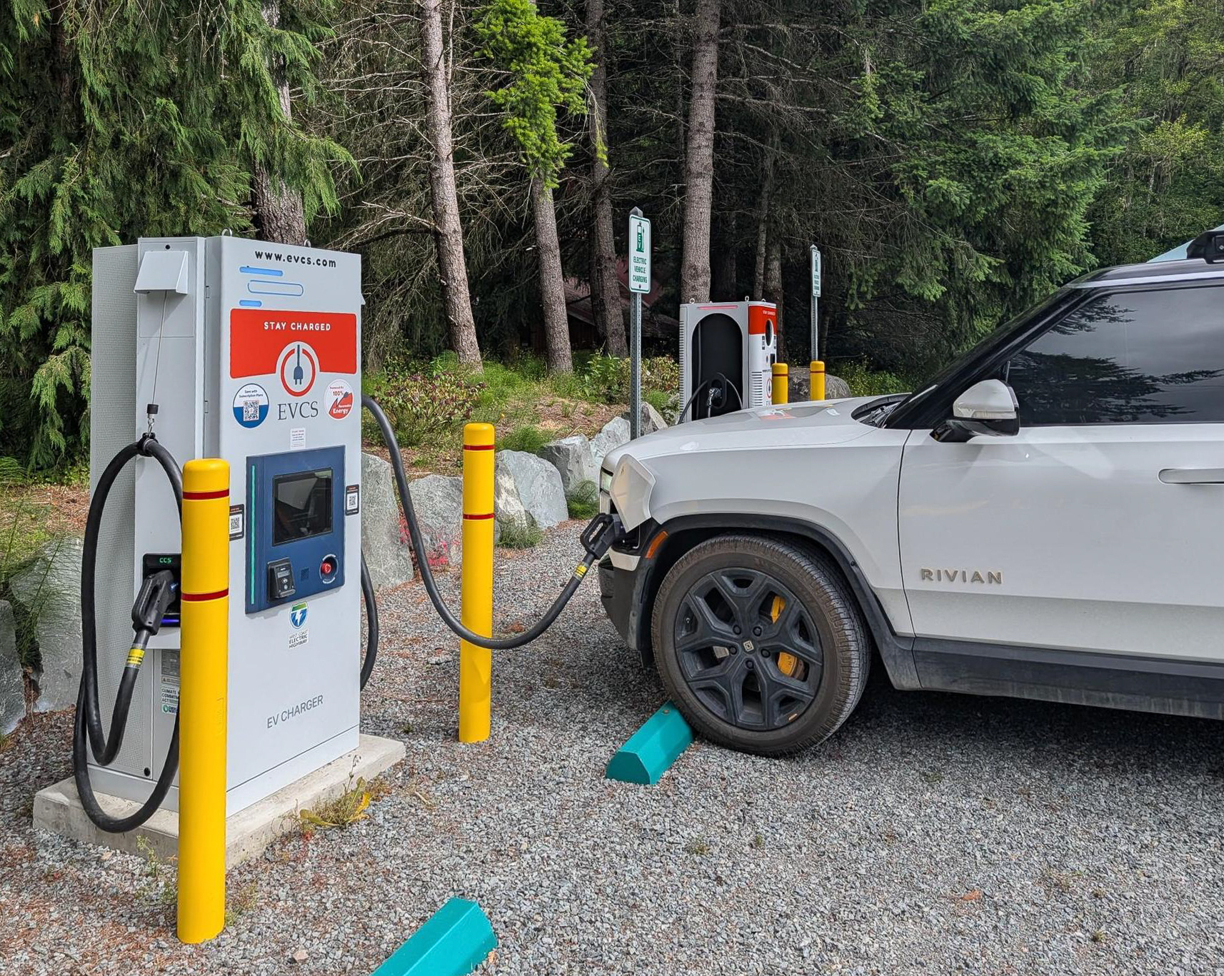 A Rivian charging at an EVCS fast charger at Rainier Basecamp, Ashford, Washington