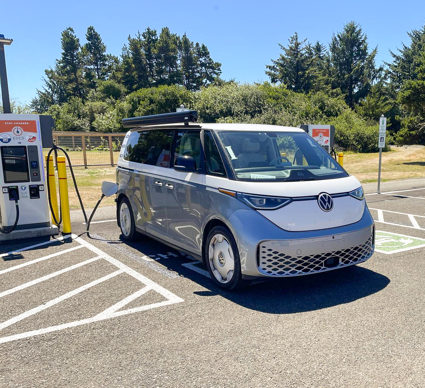 A Volkswagen ID. Buzz charging at an EVCS fast charger