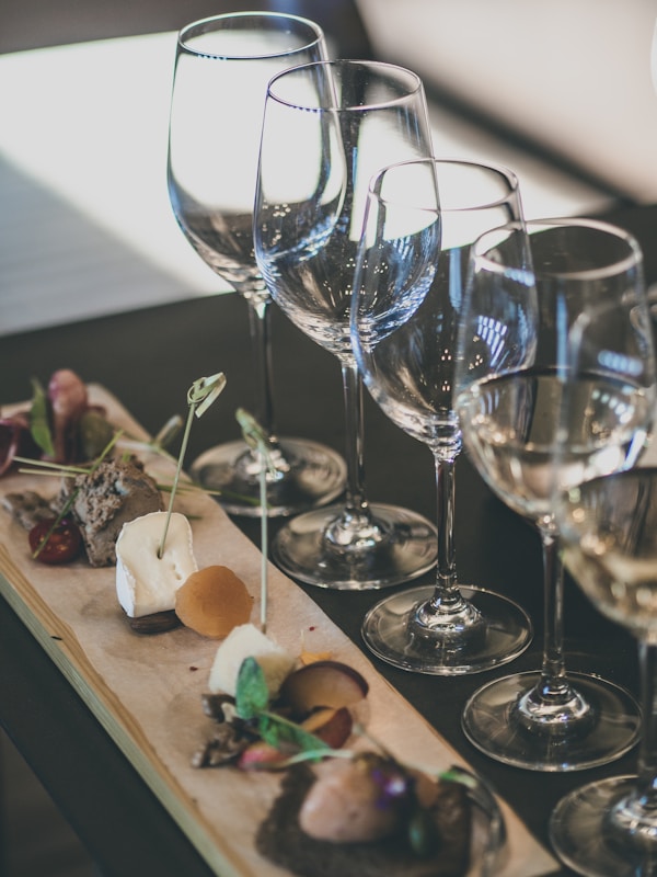 Glasses and appetizers at a wine tasting
