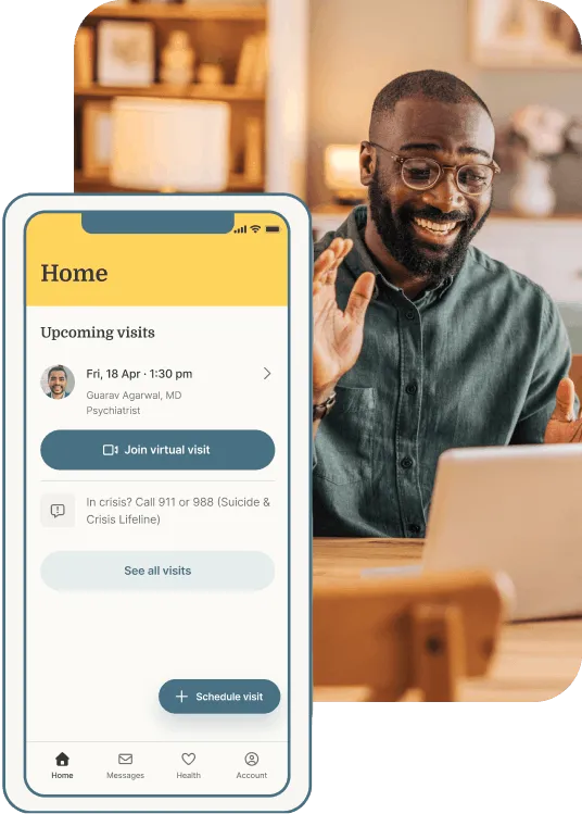 Person joining a virtual mental health visit on a laptop with a telehealth app interface displayed.