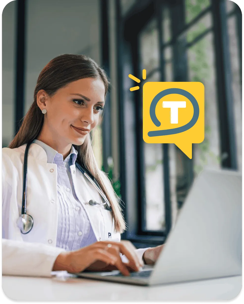 Healthcare provider using a laptop to manage patient communication on a digital platform