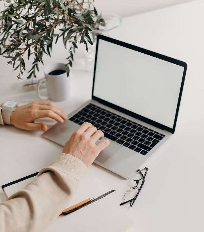 person typing on computer