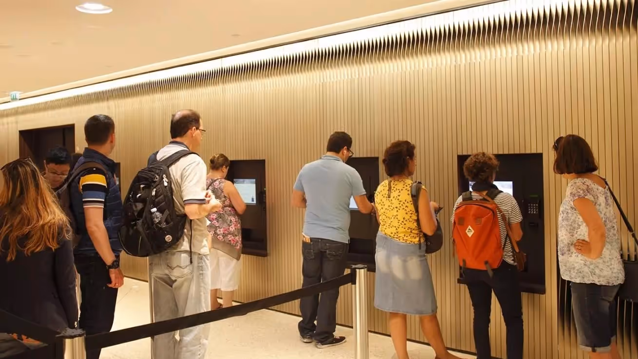 people queuing to get tickets