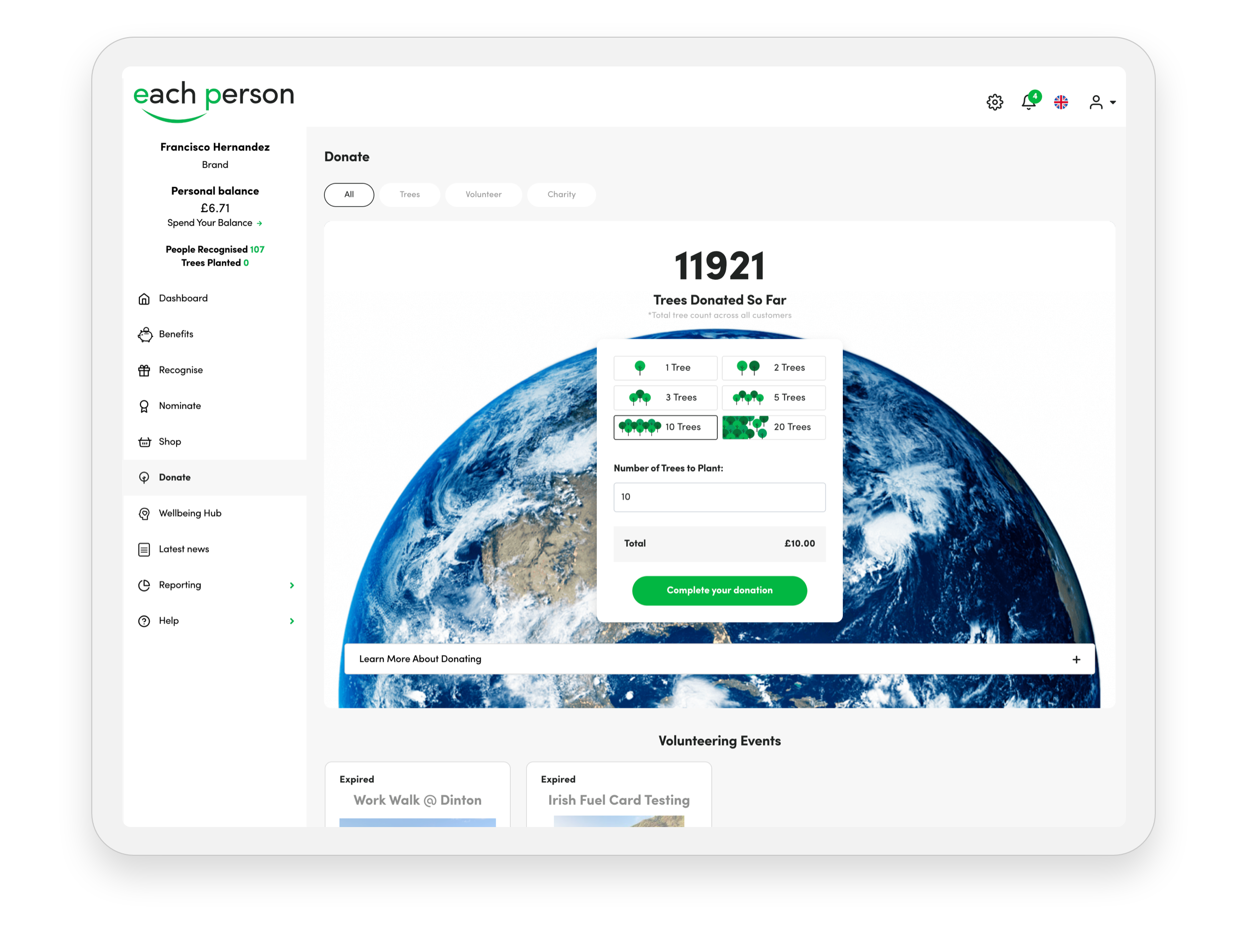 a tablet with a screen showing a website page.