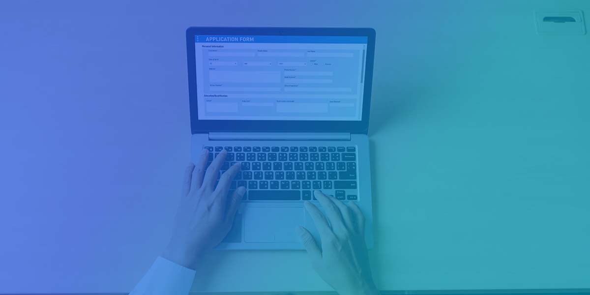 Submitting a job application online.