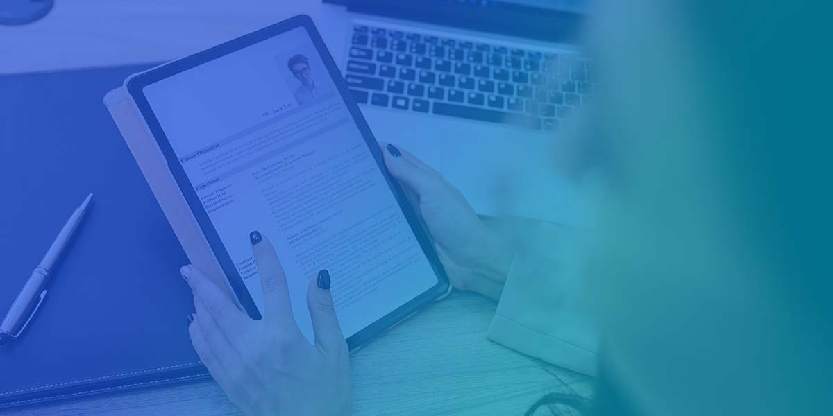 Recruiter scanning a wordy job description of a resume