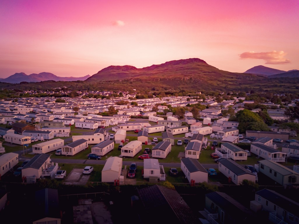 Sun set at a Caravan and camping park, static home aerial view.
