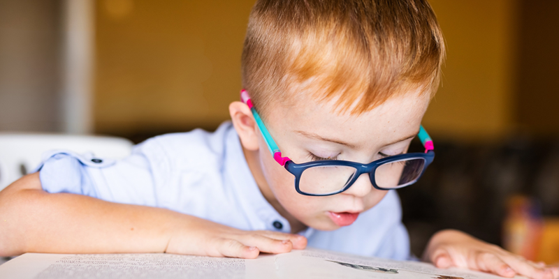 A boy reading at school