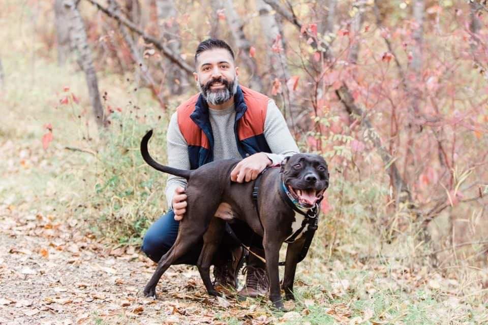 Picture of Jas Deol with dog