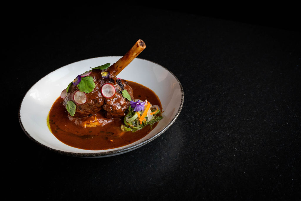 Our Barbacoa de Cordero plate. A piece of lamb shank in a garbanzo puree