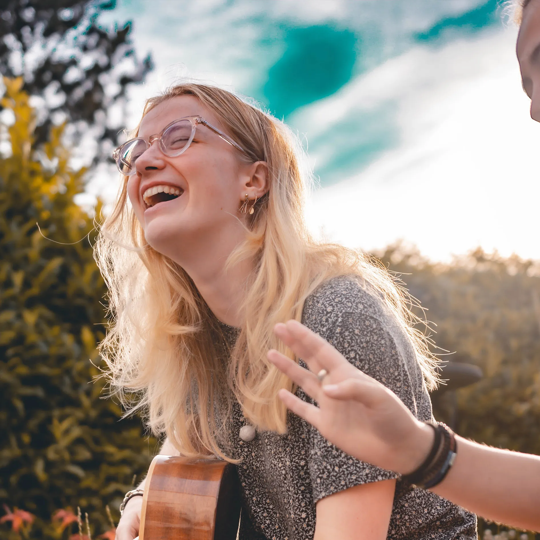 A friend laughing that there's no more awkward conversations. 