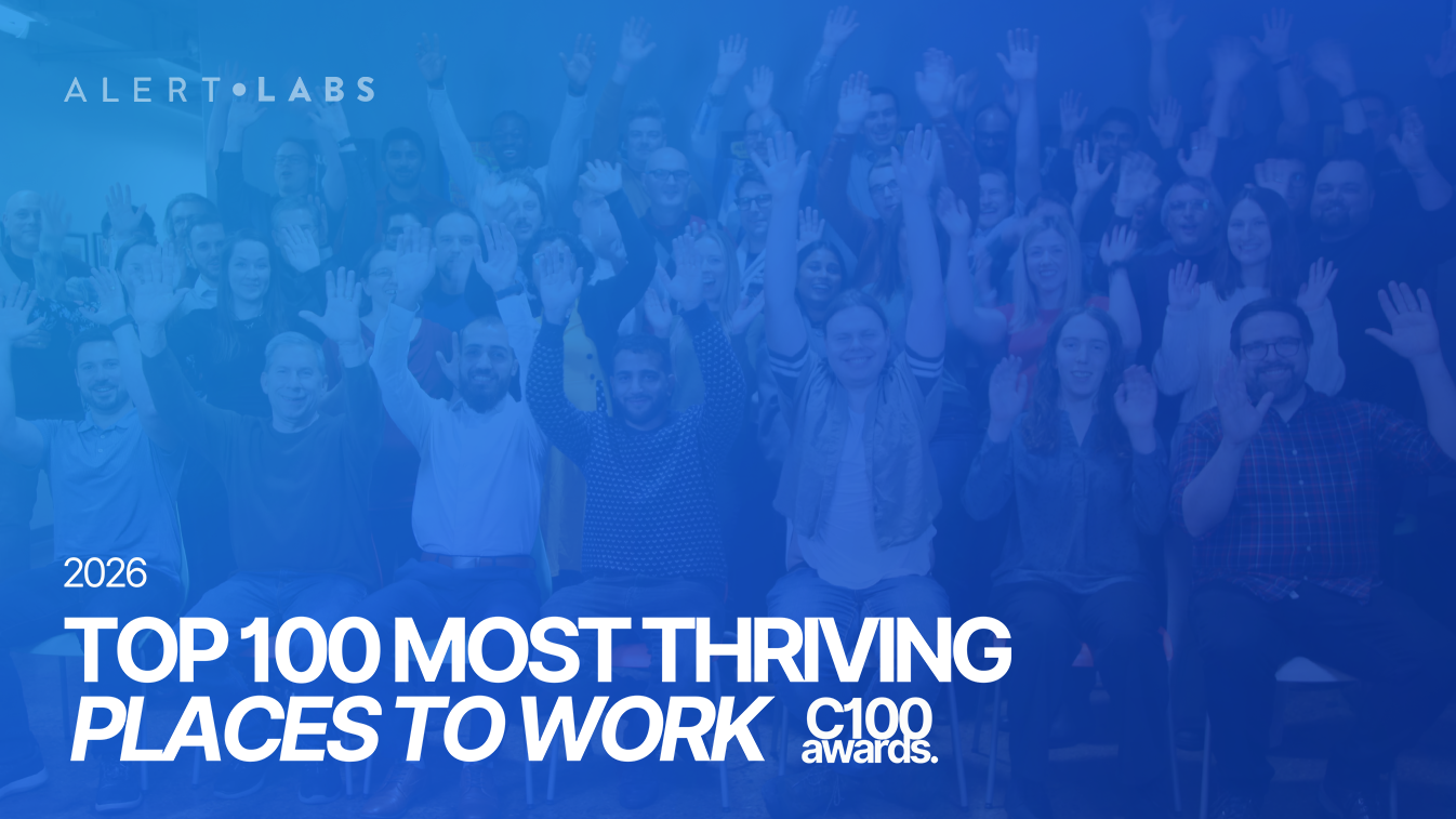 Alert Labs employees raise their hands joyfully Culture 100 award