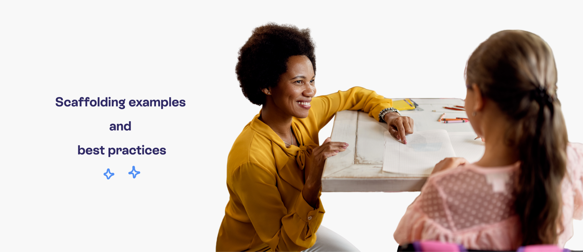 Scaffolding examples and best practices. A teacher assists a student with her work.