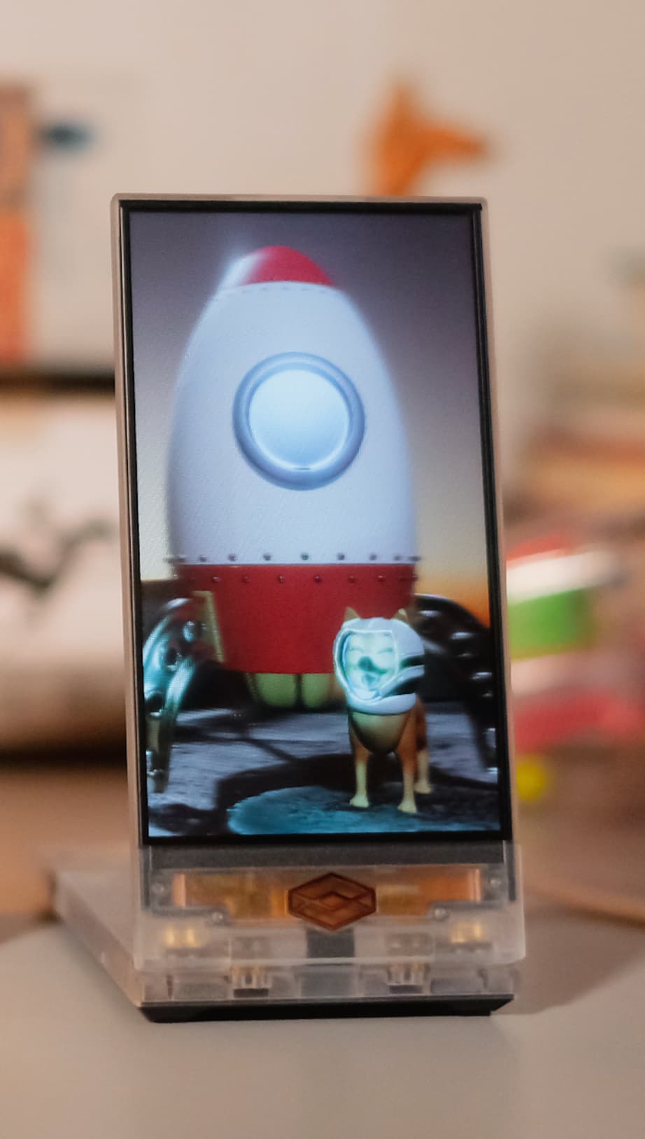 Holographic display featuring a 3D model of a flying character