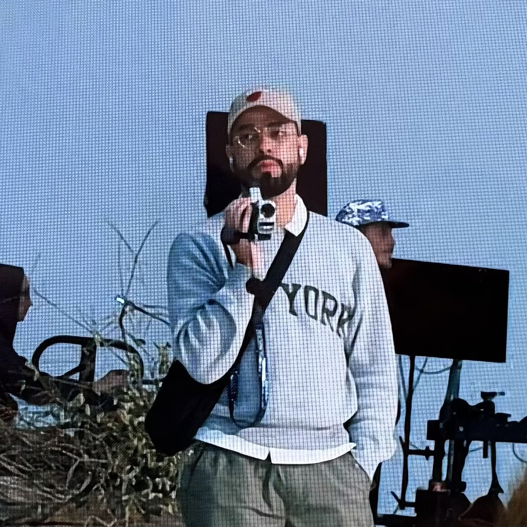 Jack holding a camera doing what he does best