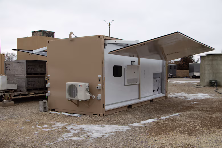 The energy node, with photovoltaic (PV) panels fully deployed, at the ERDC Forward Operating Base Laboratory in Champaign, Illinois.